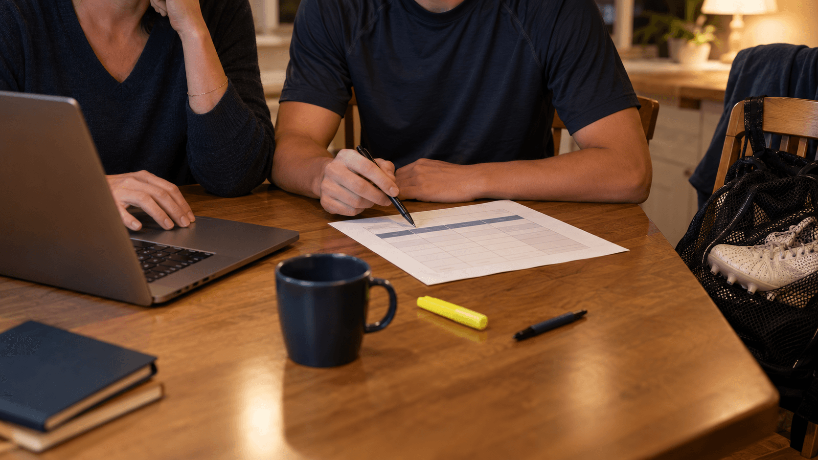 A parent and athlete comparing college eligibility rules side by side
